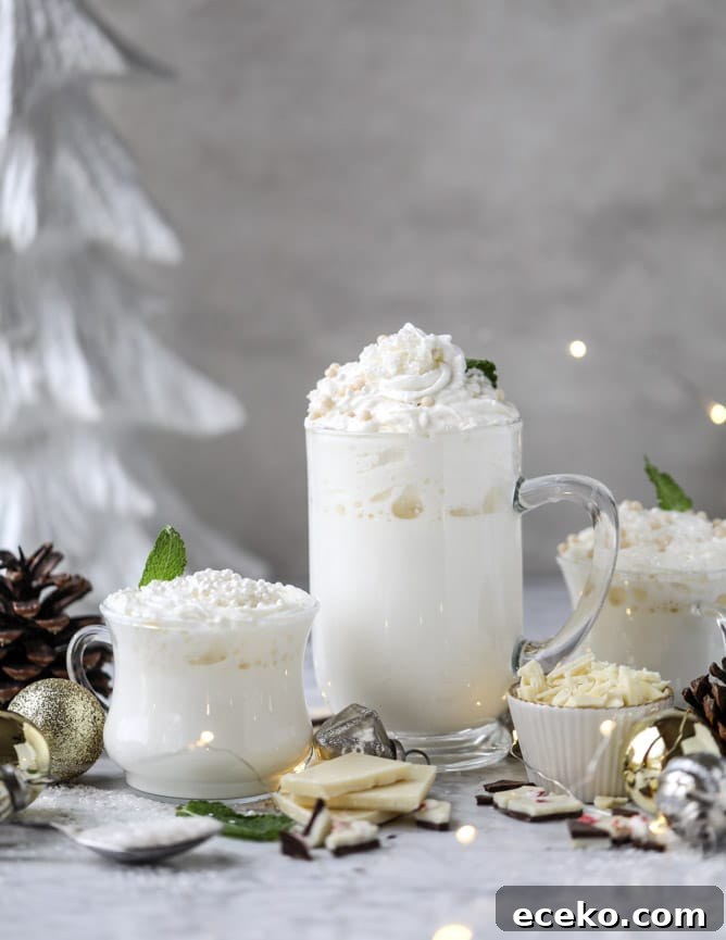 Creamy White Hot Chocolate with Fresh Mint 10 fresh mint white hot chocolate I howsweeteats.com #hotchocolate #christmas #holidays #whitechocolate