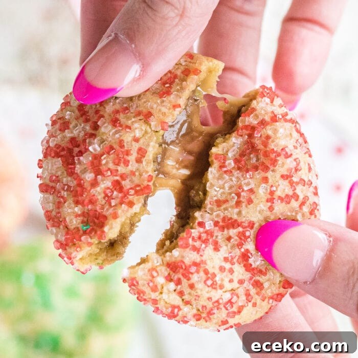 Hawaiian Shortbread Cookies with Coconut and Macadamia 11 Broken cookie showing the gooey caramel insides.